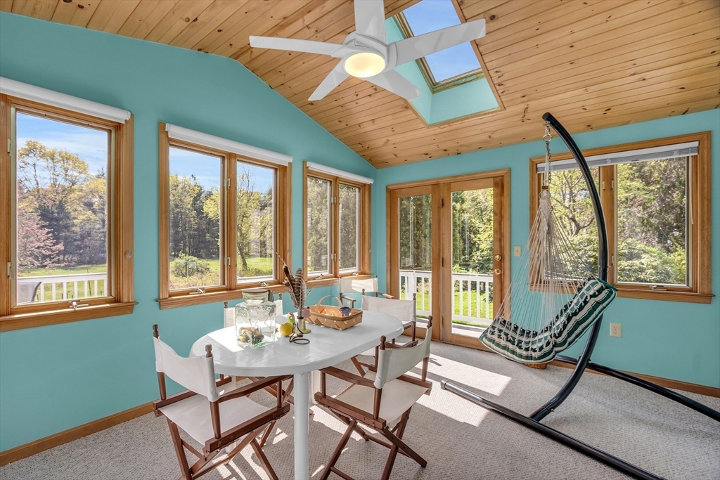 1 Chester Road Boxborough, MA 01719 - Photo 23 of 41 a dining room with furniture a rug and a large window