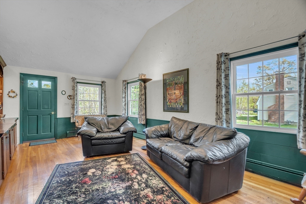 1 Chester Road Boxborough, MA 01719 - Photo 24 of 41 a living room with furniture and a couch