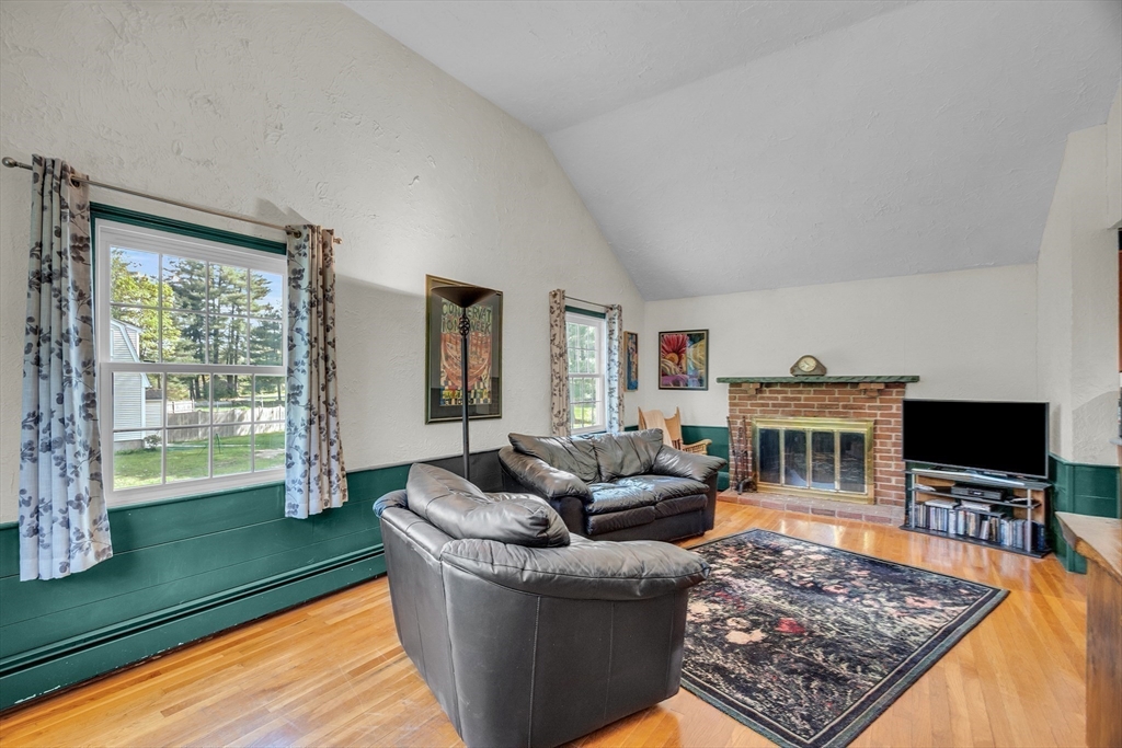 1 Chester Road Boxborough, MA 01719 - Photo 25 of 41 a living room with furniture and a flat screen tv