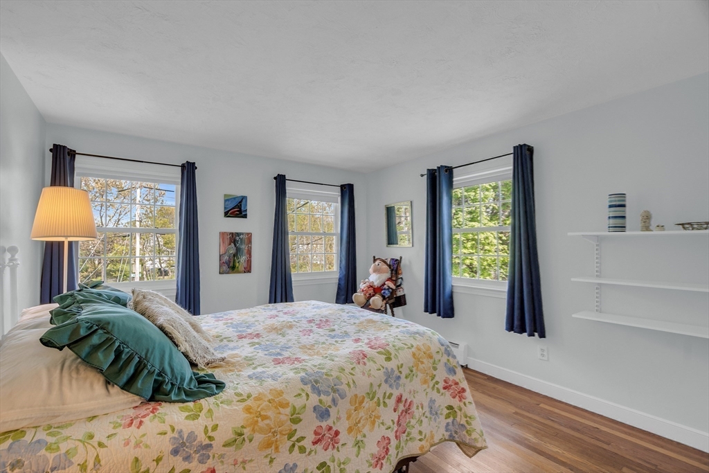 1 Chester Road Boxborough, MA 01719 - Photo 30 of 41 a bedroom with a bed and large windows