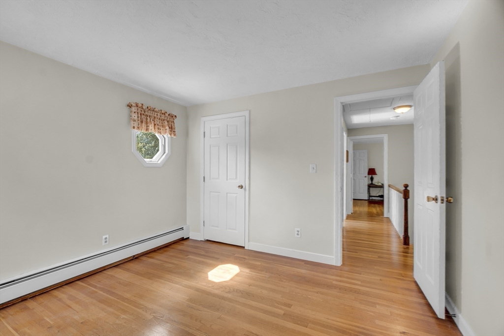 1 Chester Road Boxborough, MA 01719 - Photo 31 of 41 a view of a room with wooden floor