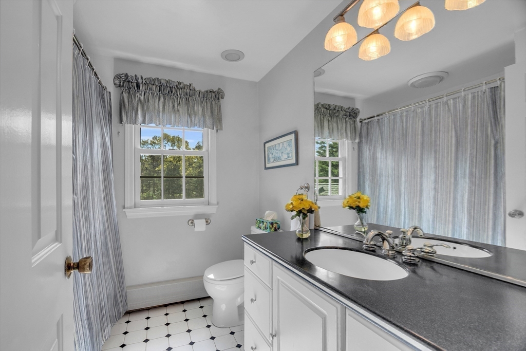1 Chester Road Boxborough, MA 01719 - Photo 32 of 41 a bathroom with a sink a toilet and shower