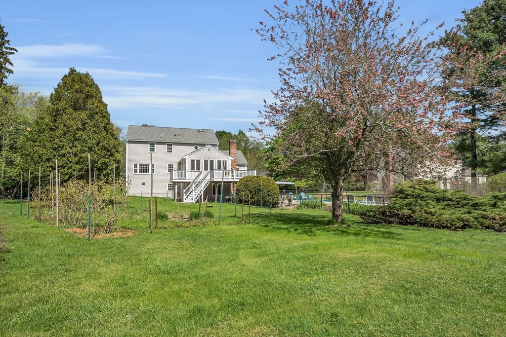 1 Chester Road Boxborough, MA 01719 - Photo 10 of 41 a view of front of house with a yard