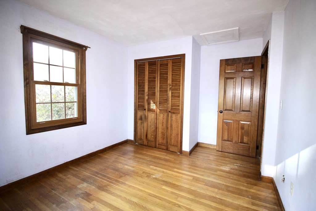 111 County Road East Freetown, MA 02717 - Photo 23 of 29 an empty room with windows and closet