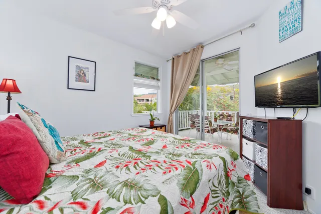 a bathroom with a sink toilet vanity and shower