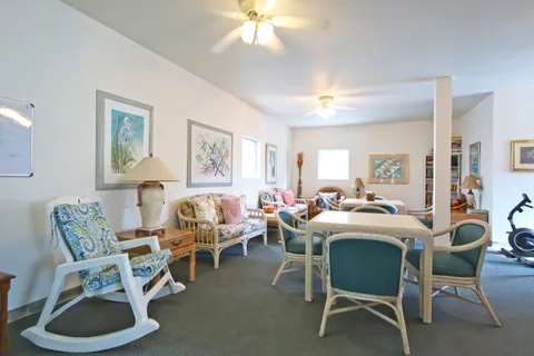 an aerial view of a house with outdoor space