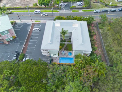 an aerial view of a house with a garden
