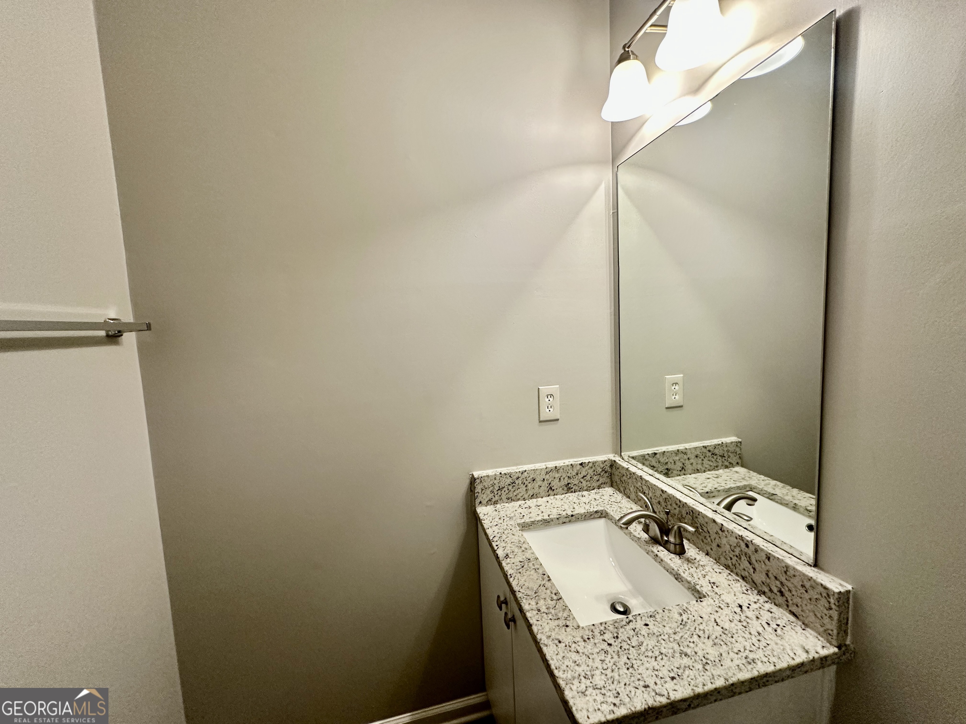 3763 Waldrop Hills Drive Decatur, GA 30034 - Photo 15 of 31 a bathroom with a sink and a mirror