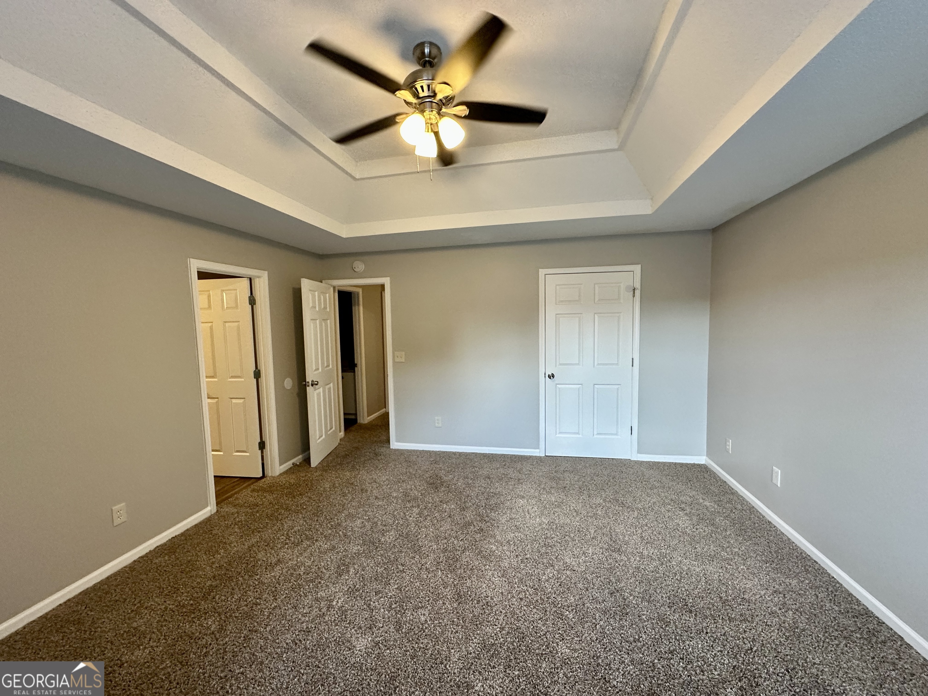 3763 Waldrop Hills Drive Decatur, GA 30034 - Photo 23 of 31 an empty room with a ceiling fan and a window