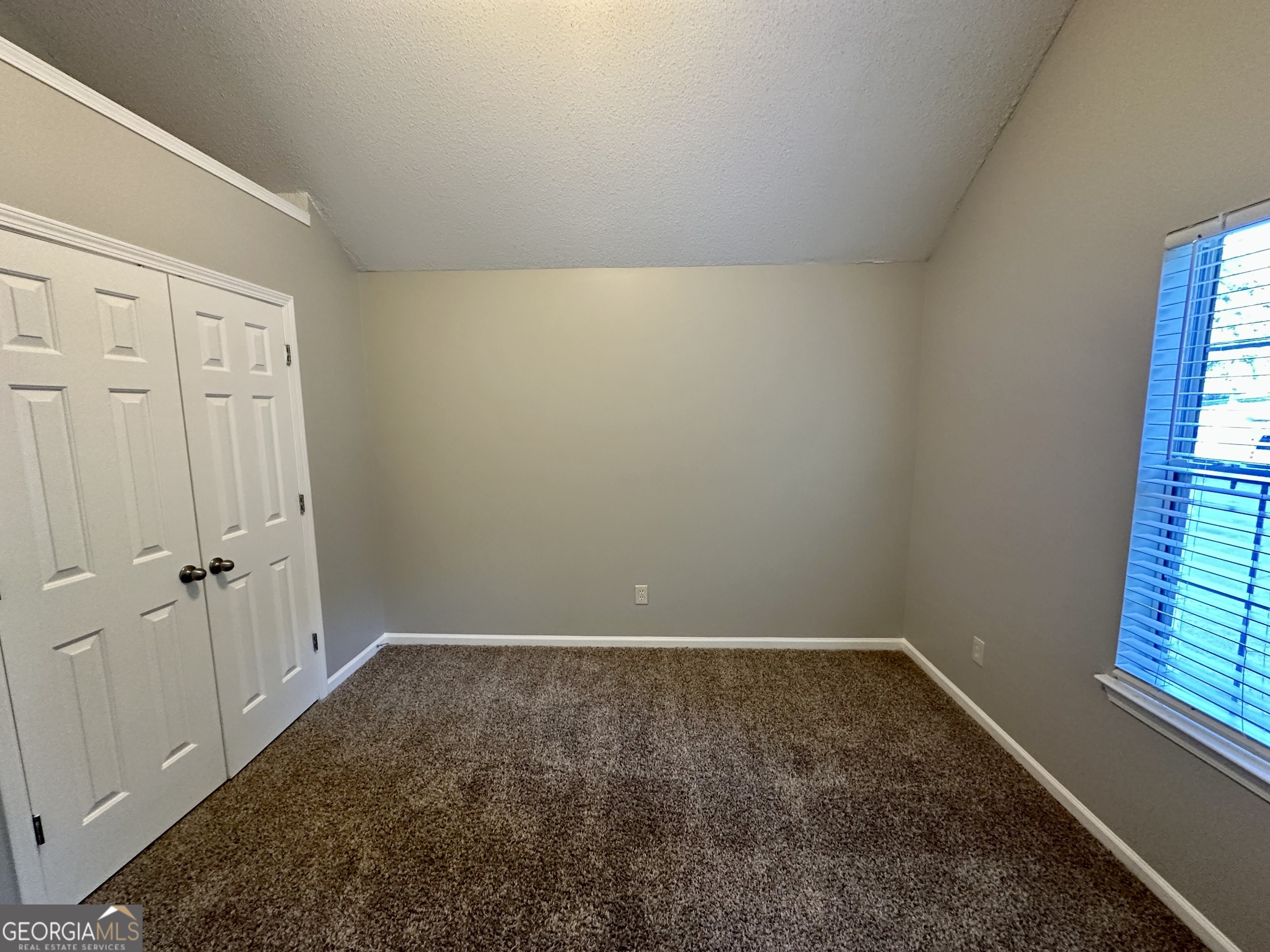 3763 Waldrop Hills Drive Decatur, GA 30034 - Photo 30 of 31 an empty room with windows