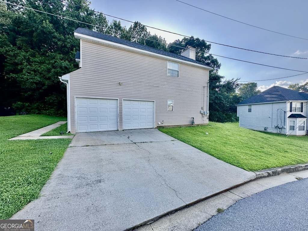 3763 Waldrop Hills Drive Decatur, GA 30034 - Photo 3 of 31 a view of a back yard of the house