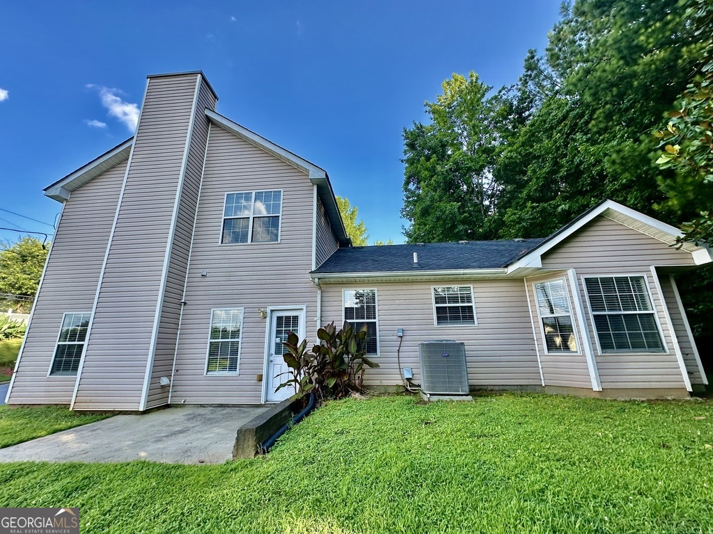 3763 Waldrop Hills Drive Decatur, GA 30034 - Photo 4 of 31 a view of a house with a yard