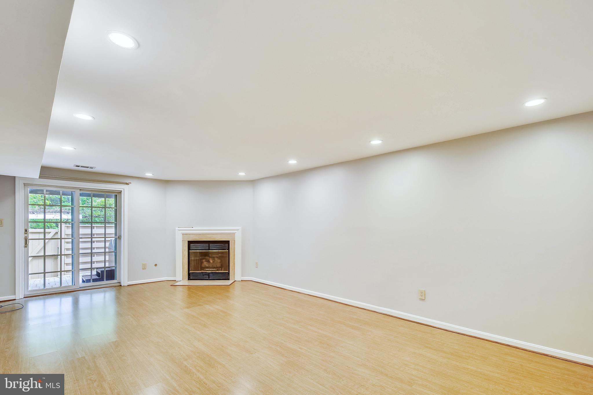 1530 Deer Point Way Reston, VA 20194 - Photo 29 of 42 an empty room with wooden floor and a window
