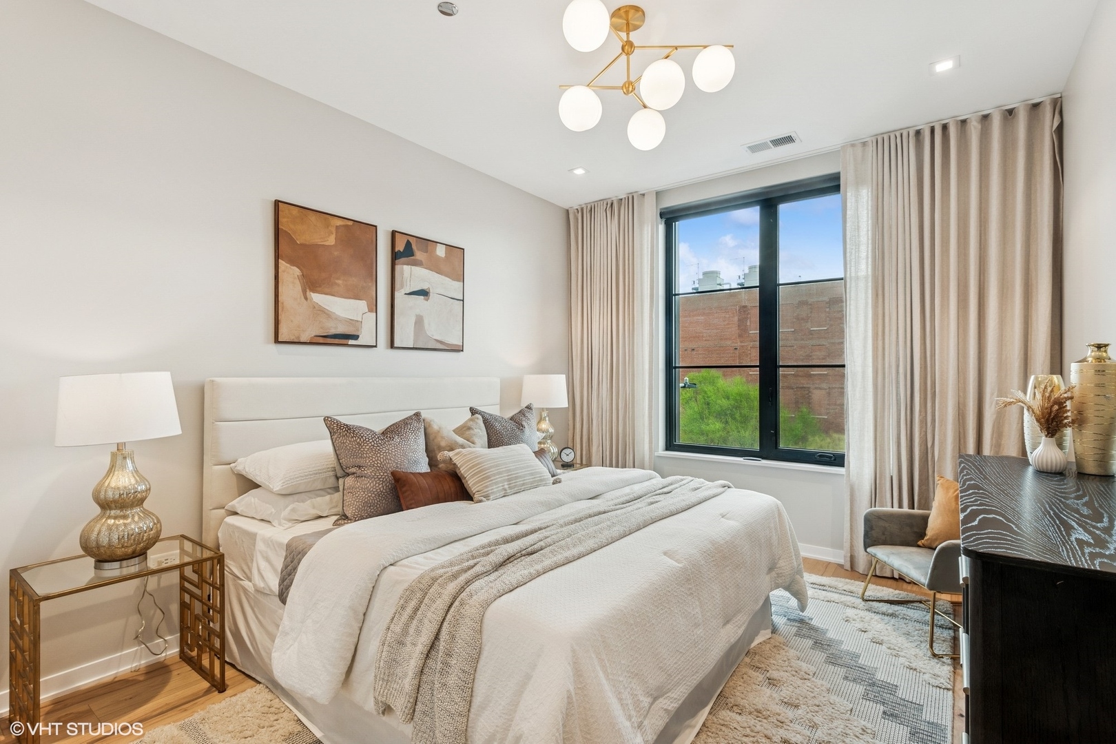 1400 West Monroe Street, Unit 4F Chicago, IL 60607 - Photo 13 of 22 a bedroom with a large bed and a window