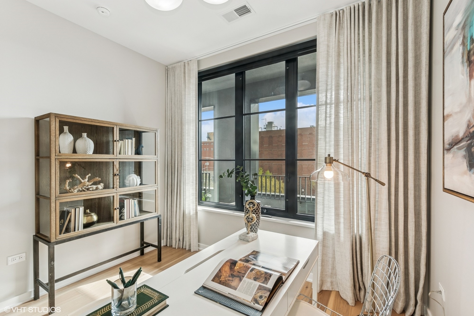 1400 West Monroe Street, Unit 4F Chicago, IL 60607 - Photo 15 of 22 a living room with furniture and a window