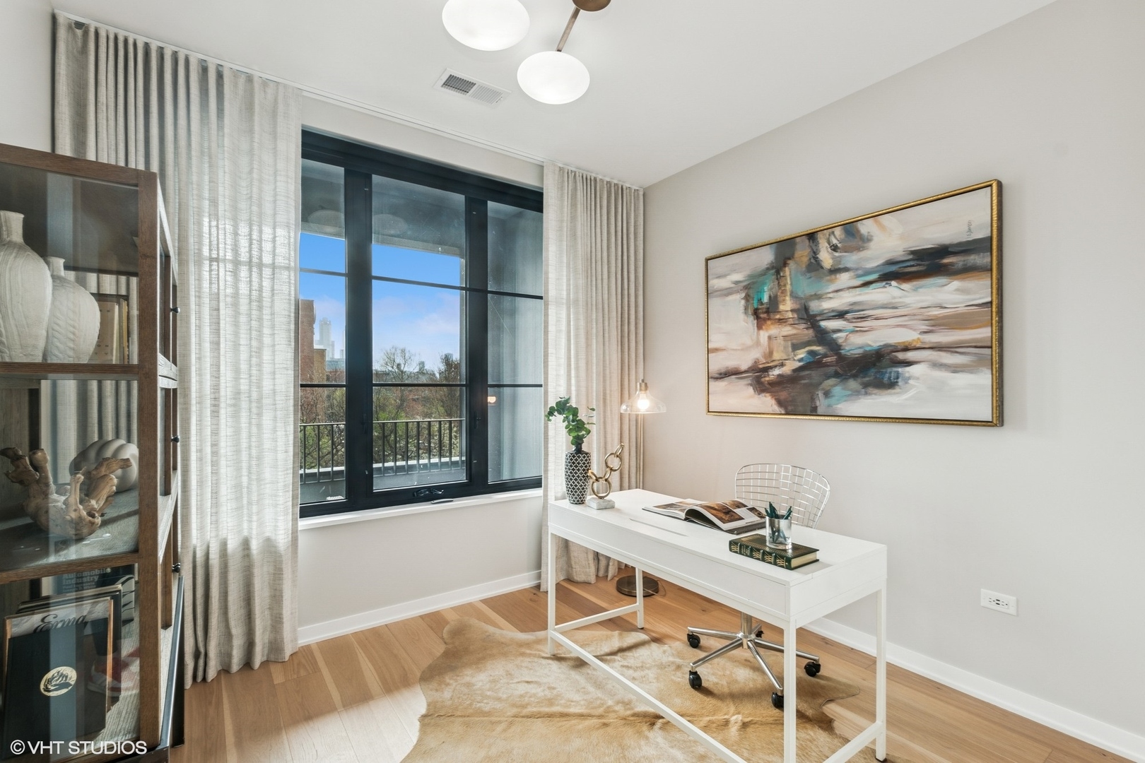 1400 West Monroe Street, Unit 4F Chicago, IL 60607 - Photo 16 of 22 a living room with furniture and a window