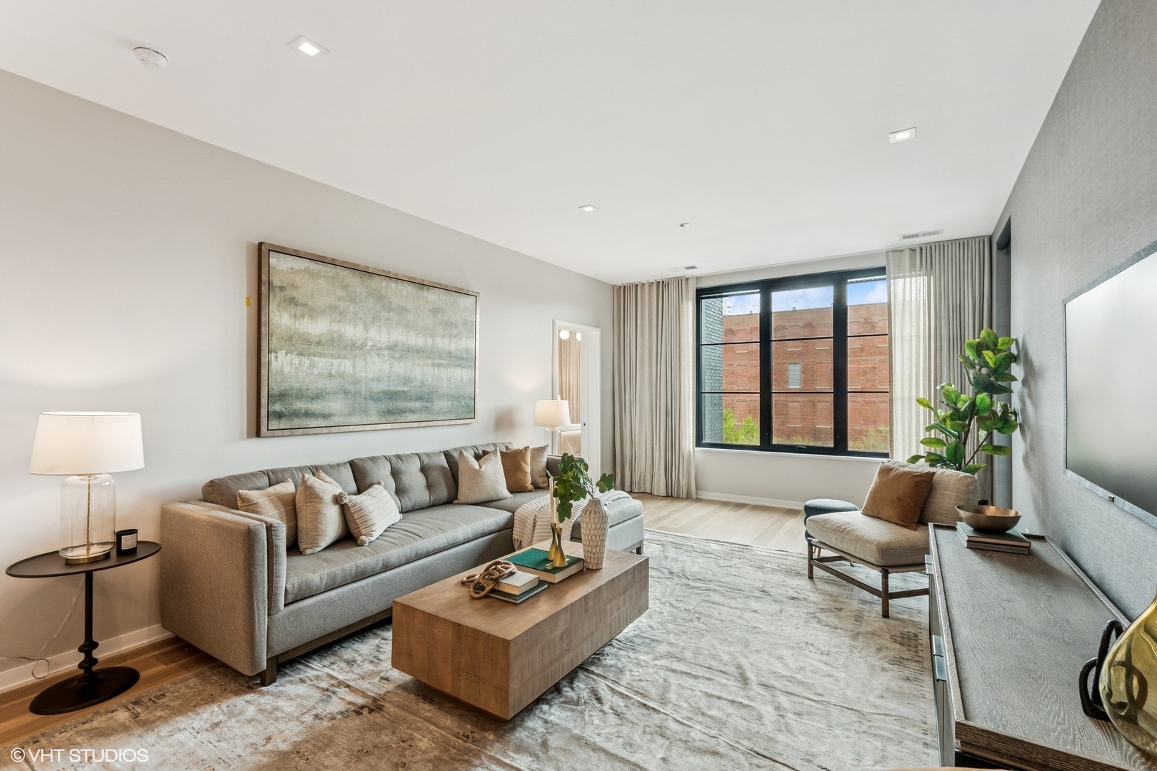 1400 West Monroe Street, Unit 4F Chicago, IL 60607 - Photo 5 of 22 a living room with furniture and a large window