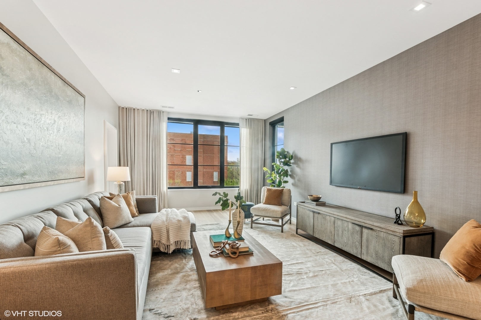 1400 West Monroe Street, Unit 4F Chicago, IL 60607 - Photo 6 of 22 a living room with furniture and a flat screen tv