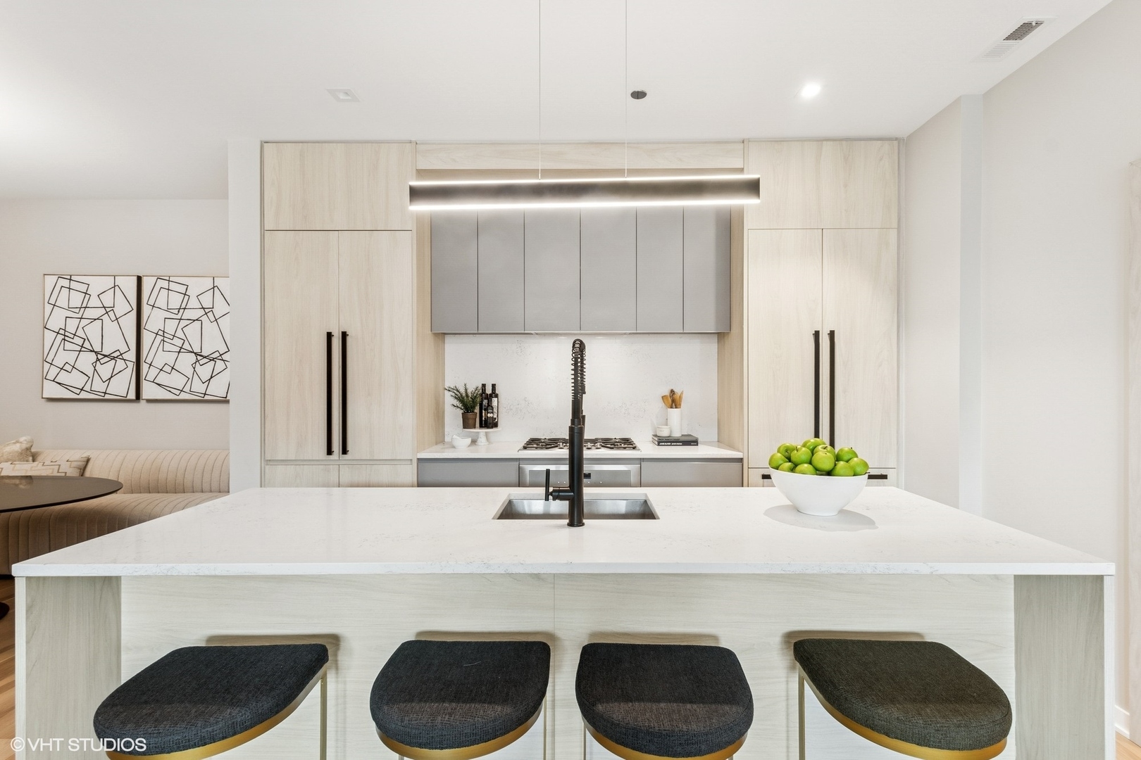 1400 West Monroe Street, Unit 4F Chicago, IL 60607 - Photo 10 of 22 a kitchen with a sink a stove and a refrigerator with wooden floor