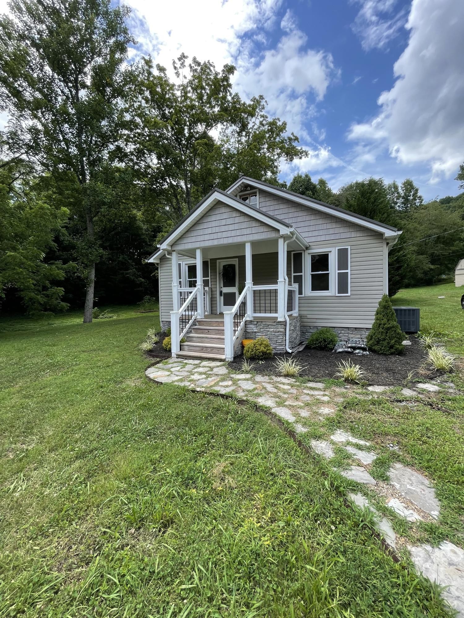 474 Pumpkin Hollow Road Heiskell, TN 37754 - Photo 1 of 22 a front view of house with yard and green space