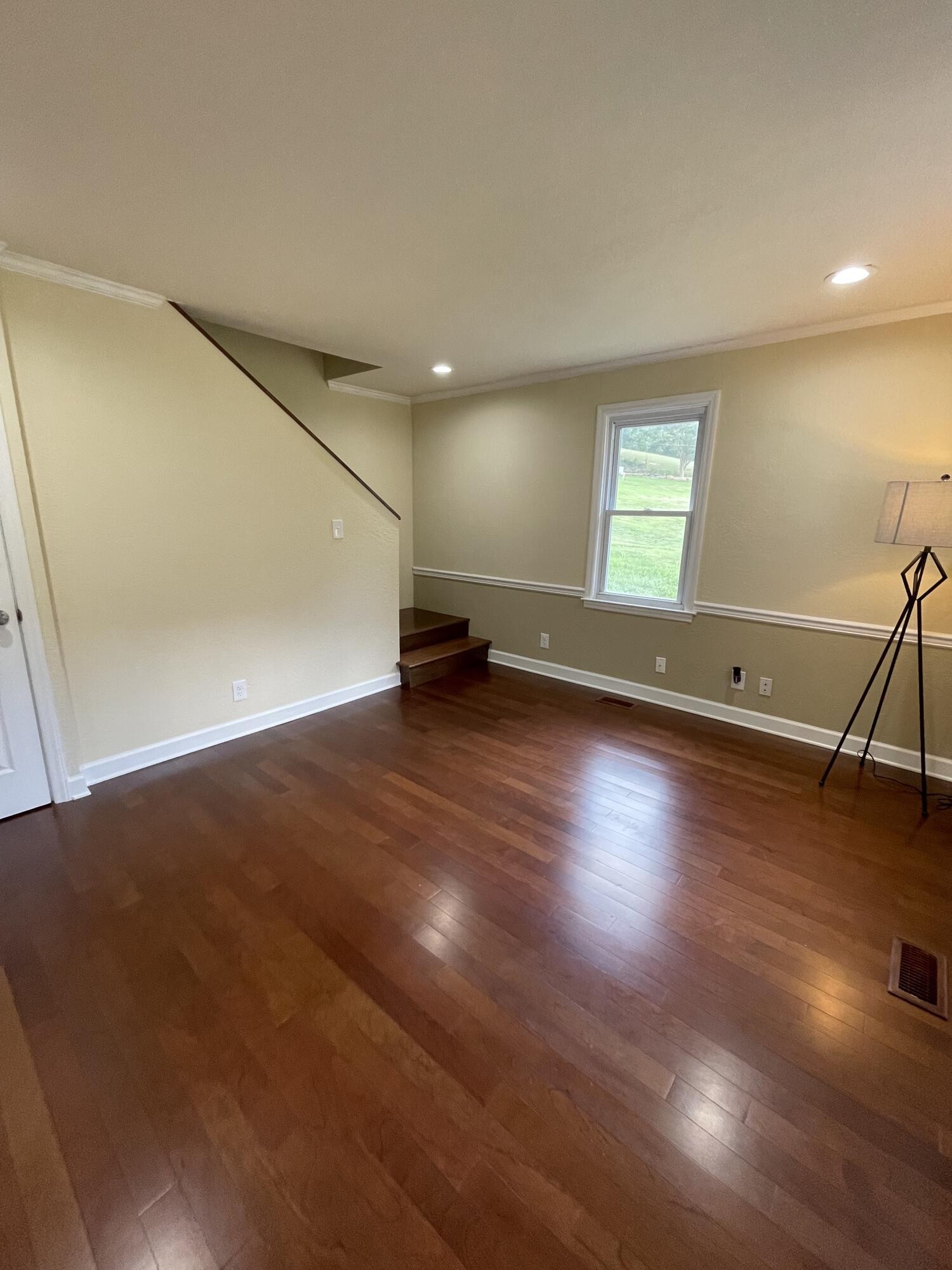 474 Pumpkin Hollow Road Heiskell, TN 37754 - Photo 15 of 22 an empty room with wooden floor and windows