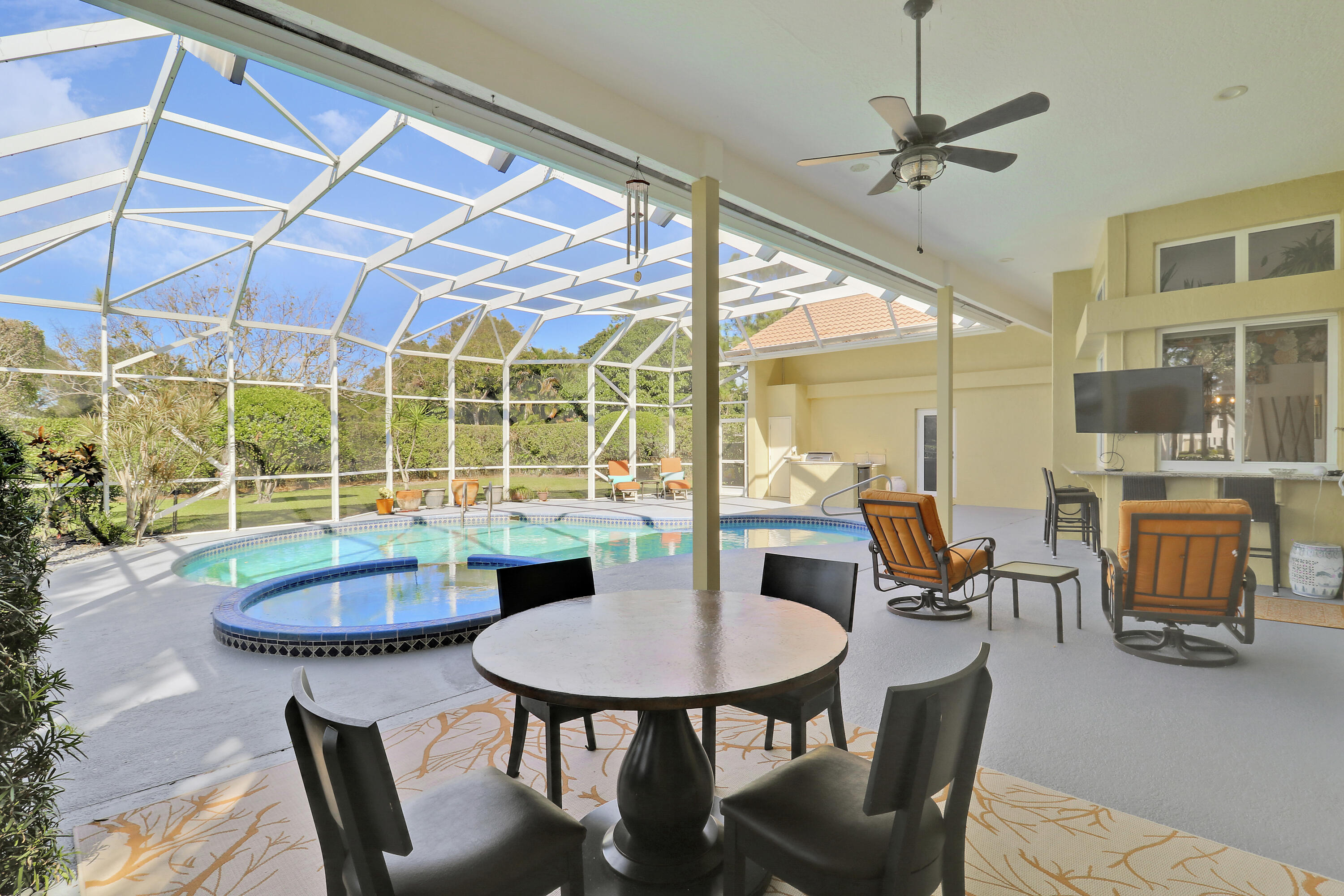 5213 Desert Vixen Road Palm Beach Gardens, FL 33418 - Photo 24 of 28 a view of a dining room with furniture window and outside view