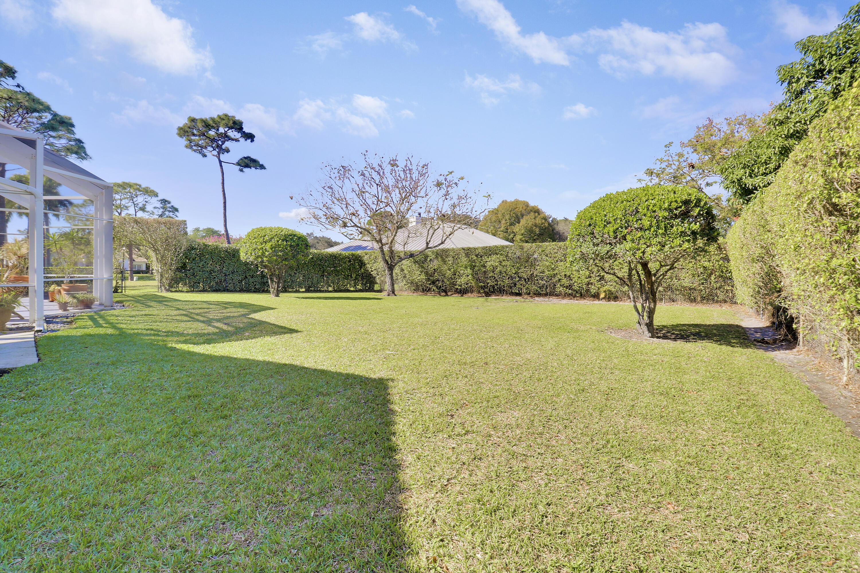 5213 Desert Vixen Road Palm Beach Gardens, FL 33418 - Photo 26 of 28 a view of a garden