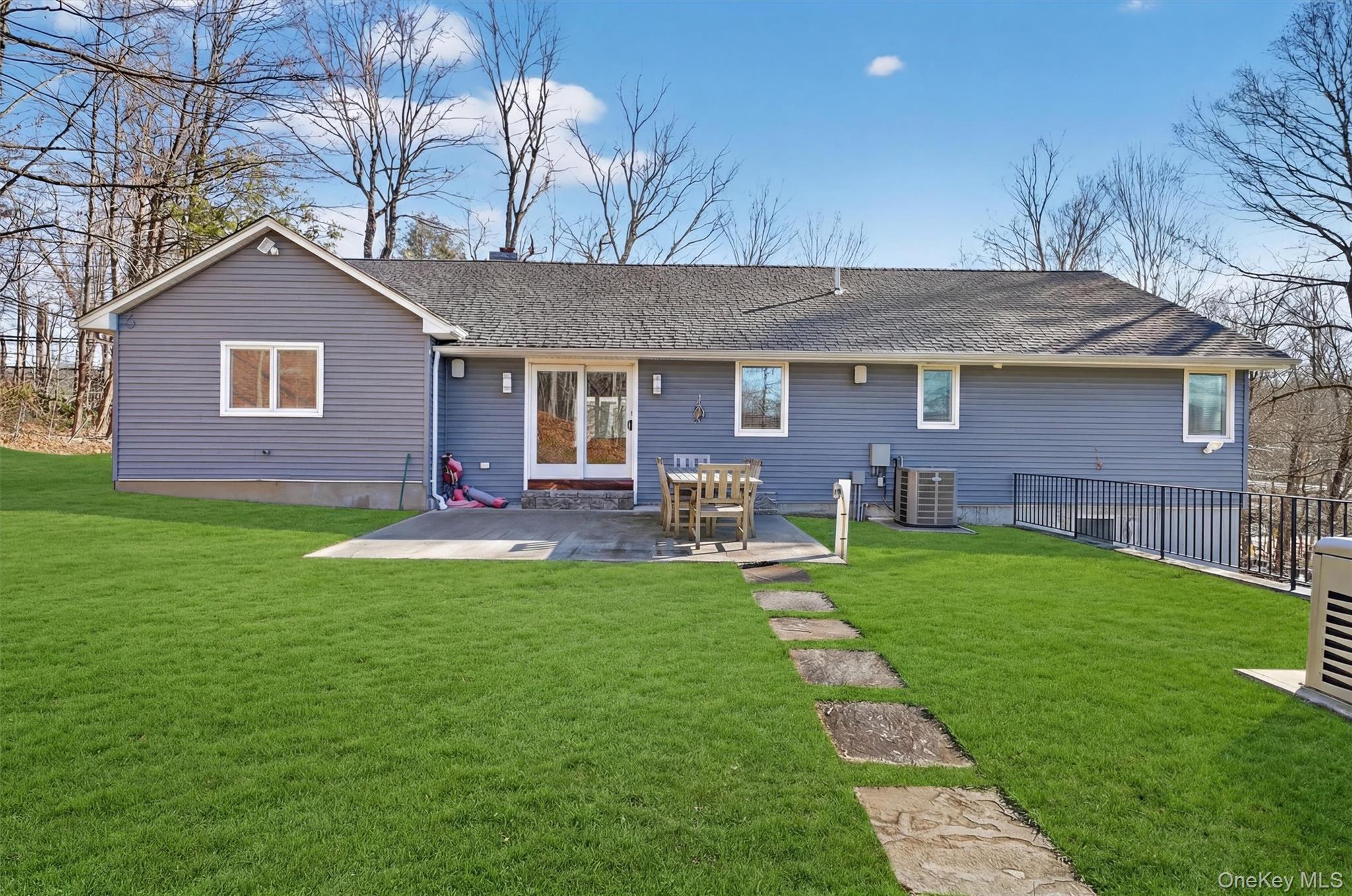 200 South Bedford Road Chappaqua, NY 10514 - Photo 33 of 38 a front view of a house with a yard
