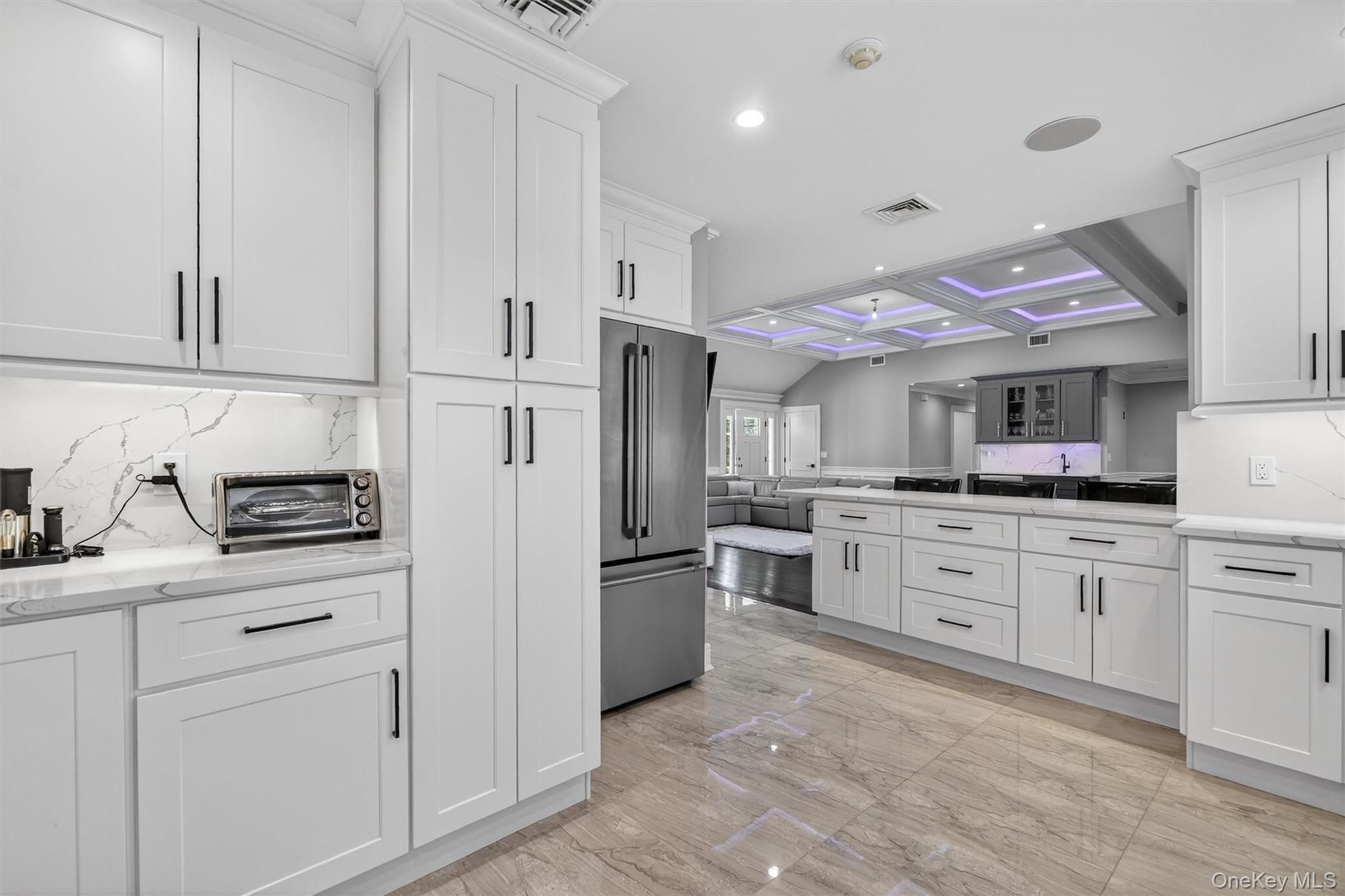 200 South Bedford Road Chappaqua, NY 10514 - Photo 8 of 38 a kitchen with cabinets stainless steel appliances and a window