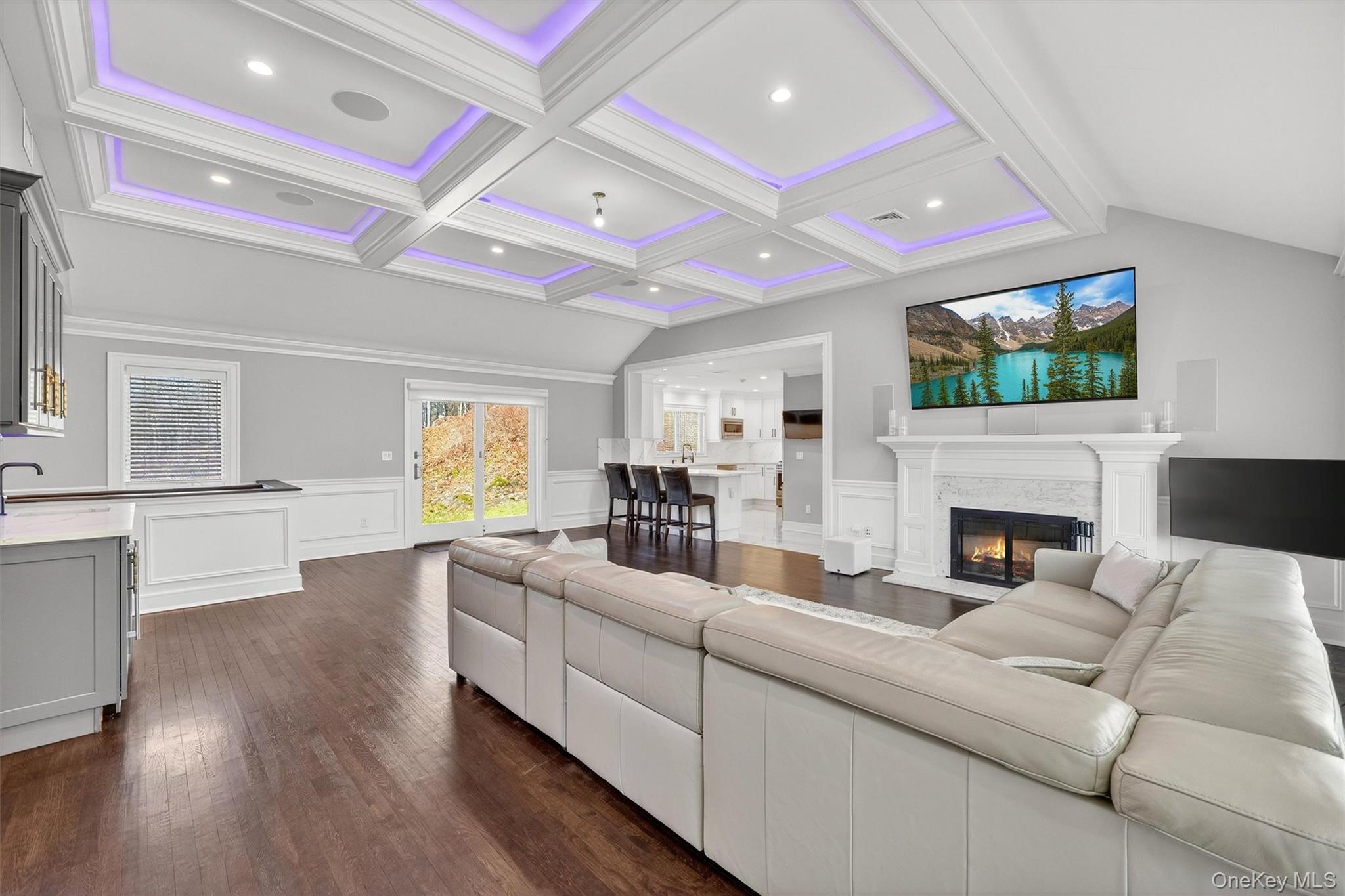 200 South Bedford Road Chappaqua, NY 10514 - Photo 10 of 38 a living room with fireplace furniture and a flat screen tv
