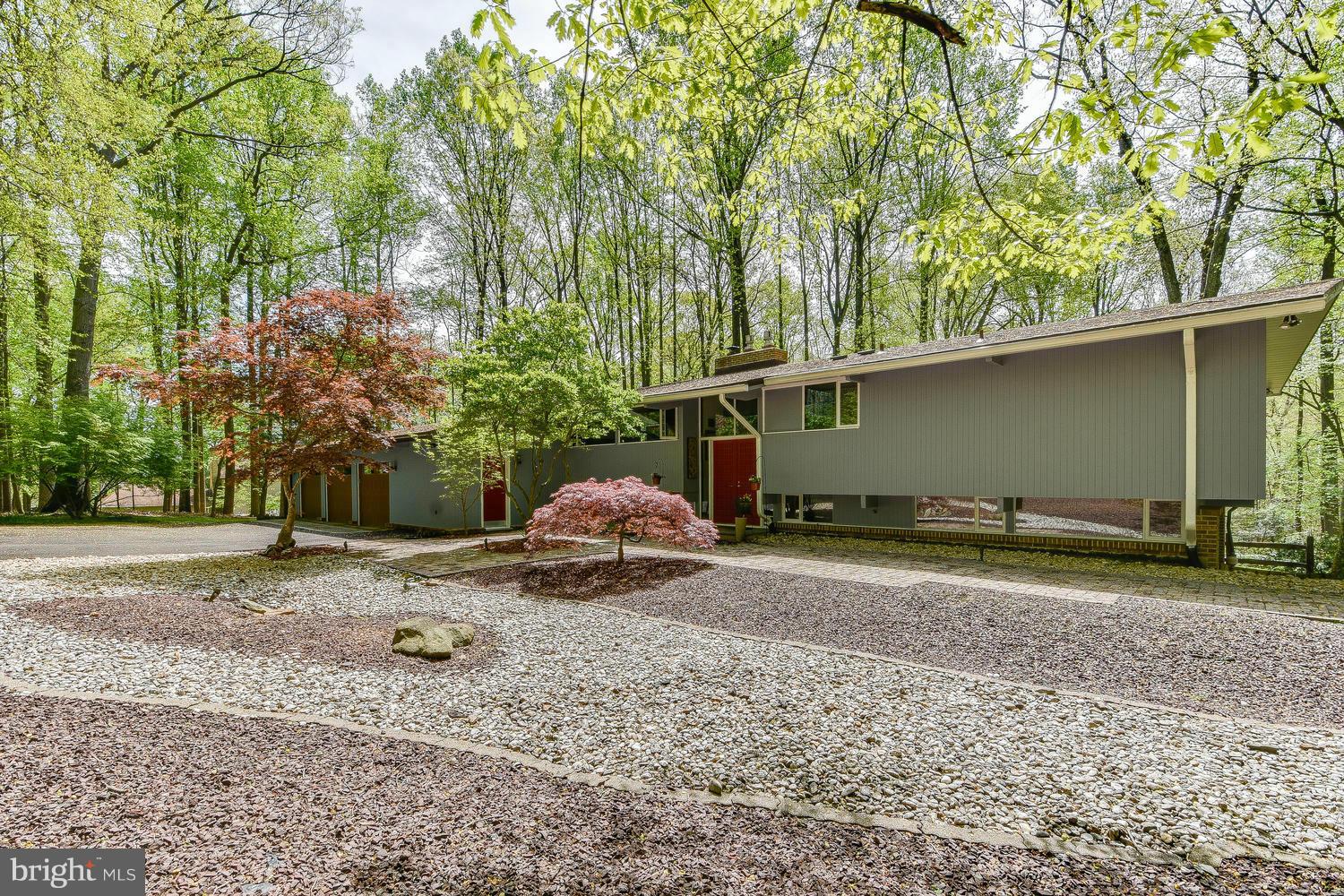 2004 Rebecca Court Silver Spring, MD 20906 - Photo 1 of 30 a backyard of a house with a yard and garage
