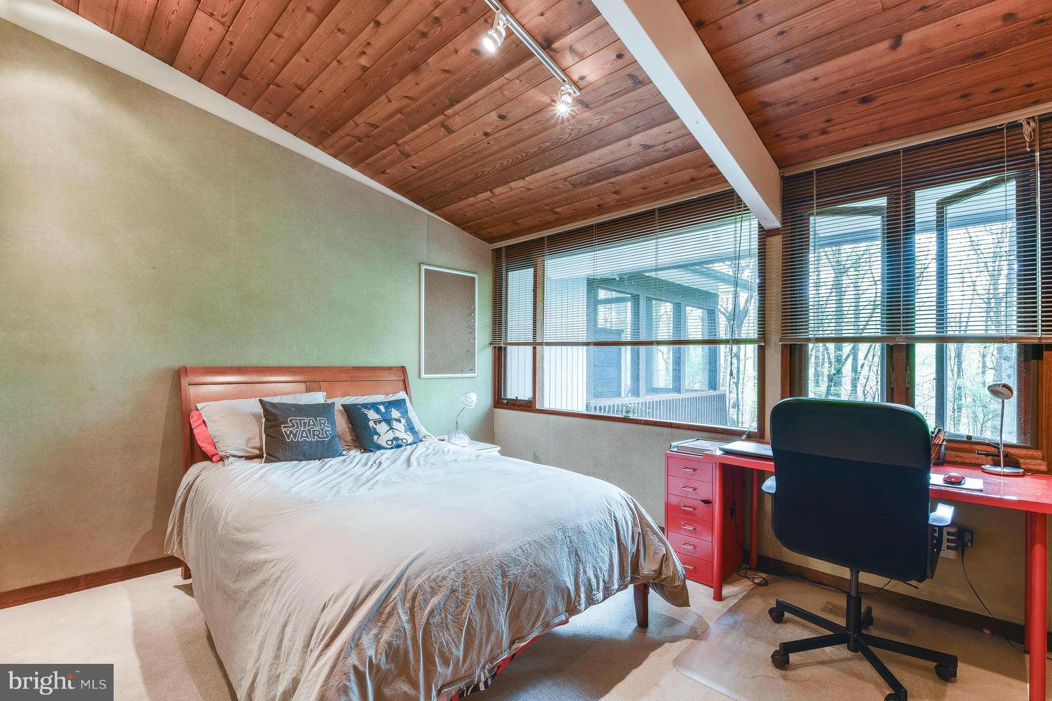 2004 Rebecca Court Silver Spring, MD 20906 - Photo 12 of 30 a bedroom with a bed chair and a large window