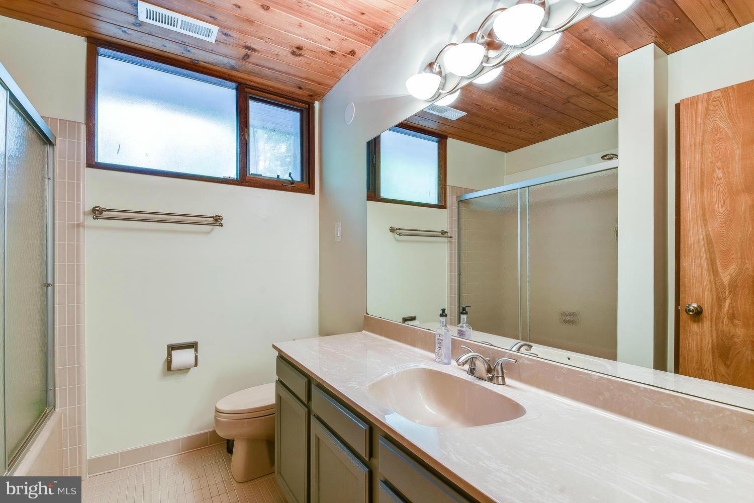 2004 Rebecca Court Silver Spring, MD 20906 - Photo 17 of 30 a bathroom with a sink toilet and shower