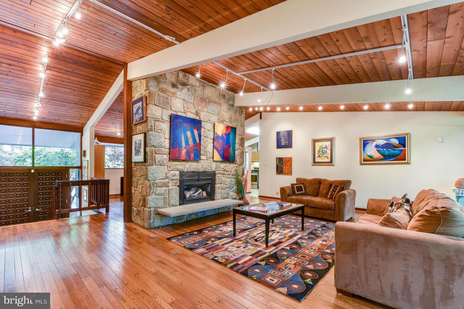 2004 Rebecca Court Silver Spring, MD 20906 - Photo 3 of 30 a living room with fireplace furniture and a wooden floor