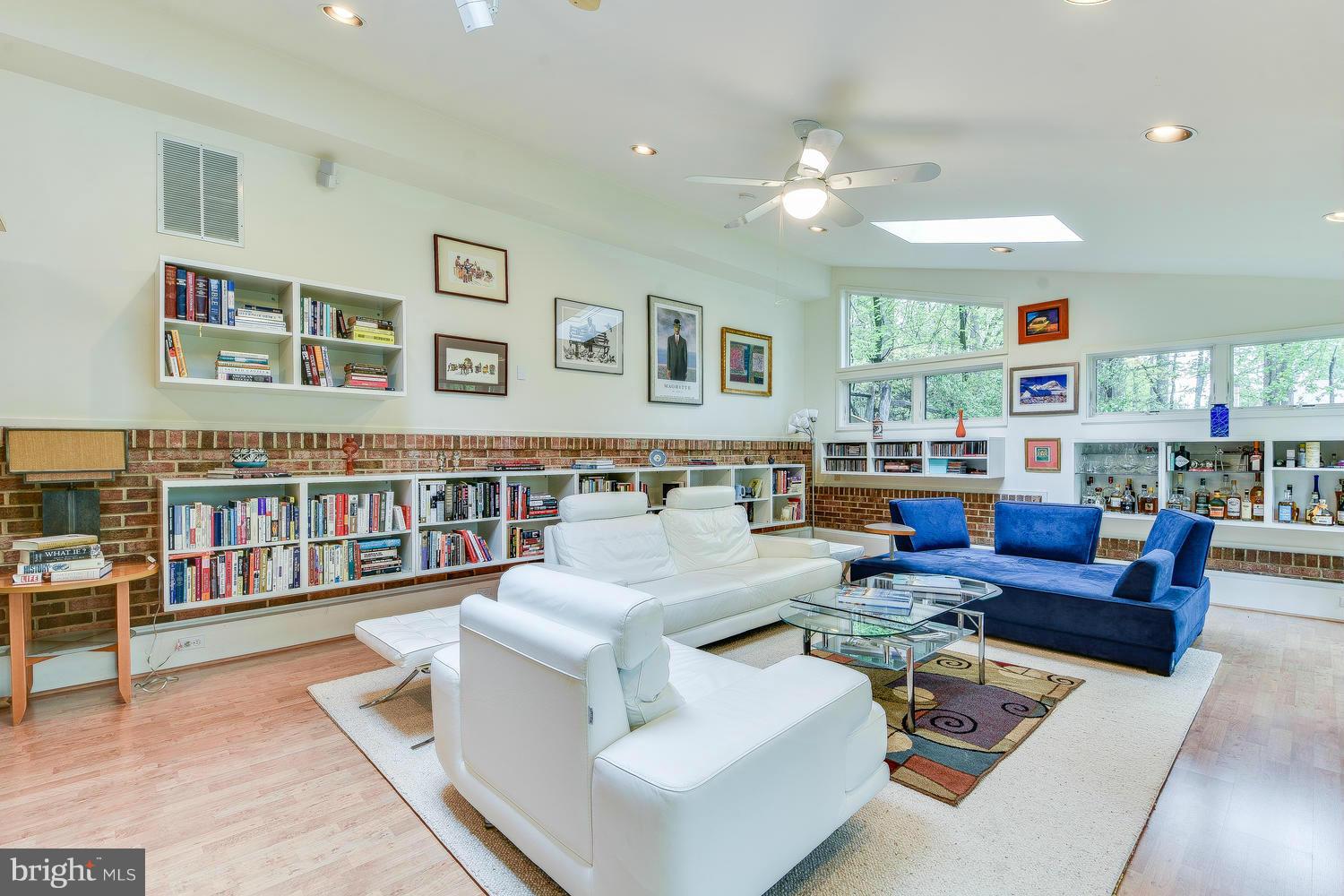 2004 Rebecca Court Silver Spring, MD 20906 - Photo 22 of 30 a living room with furniture and book shelf
