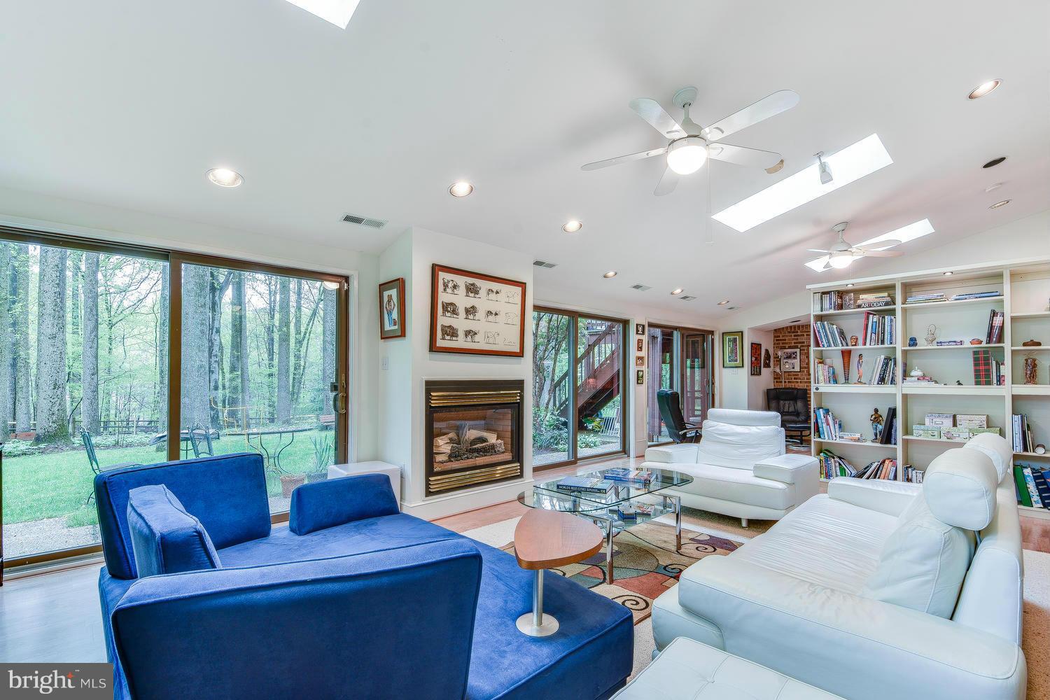 2004 Rebecca Court Silver Spring, MD 20906 - Photo 24 of 30 a living room with fireplace furniture and a large window