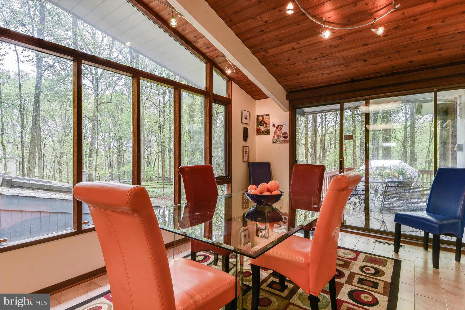 2004 Rebecca Court Silver Spring, MD 20906 - Photo 8 of 30 a dining room with furniture a chandelier and wooden floor