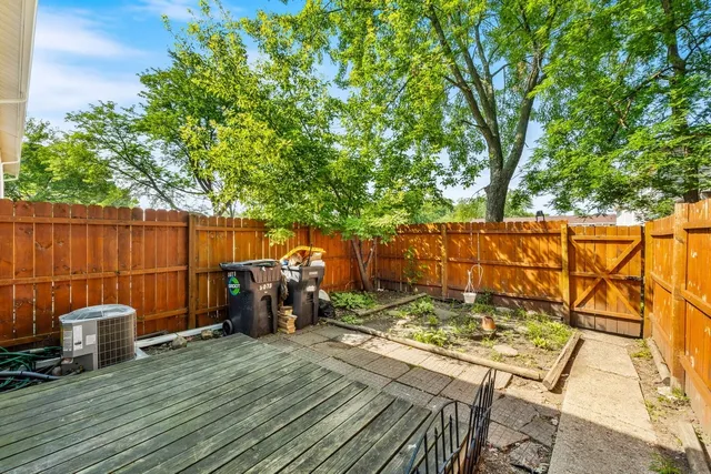 a view of a wooden deck with a patio