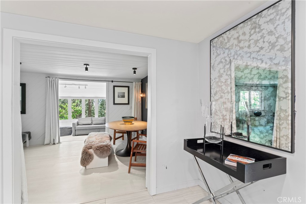 609 Millburn Road Lake Arrowhead, CA 92352 - Photo 15 of 60 a living room with furniture and a window