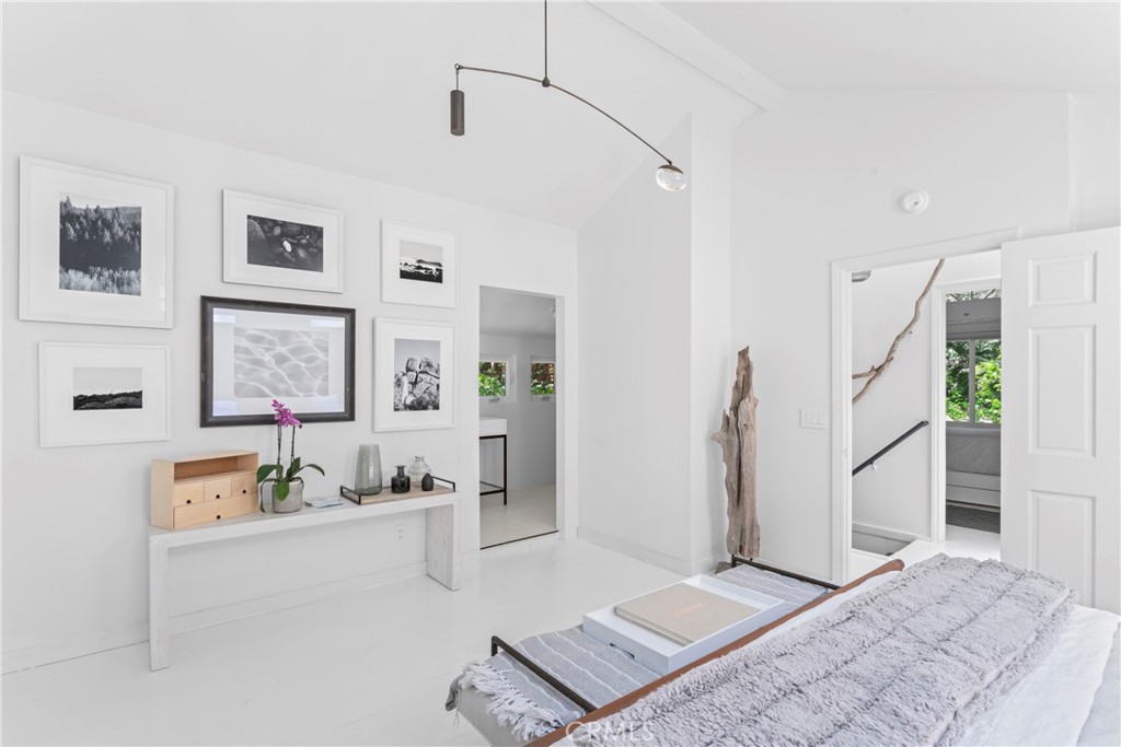 609 Millburn Road Lake Arrowhead, CA 92352 - Photo 42 of 60 a living room with furniture and a flat screen tv