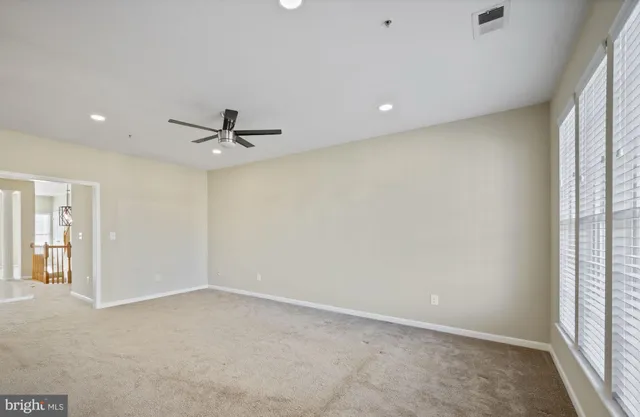 a view of a balcony with chairs