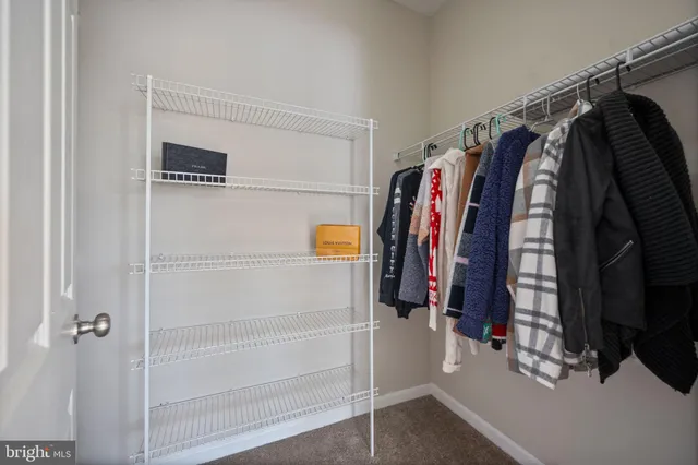 a bathroom with a double vanity sink mirror and