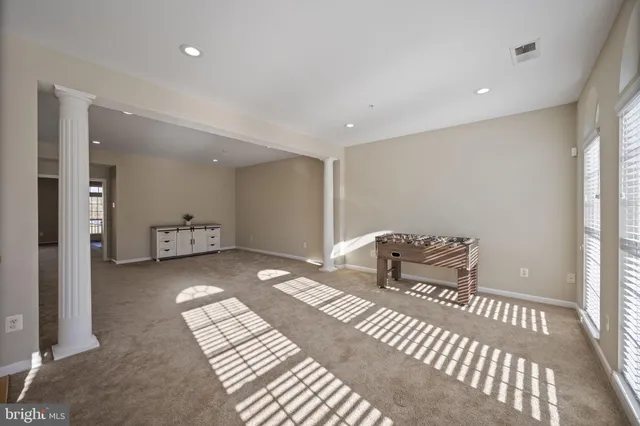 a bedroom with a bed and a walk in closet