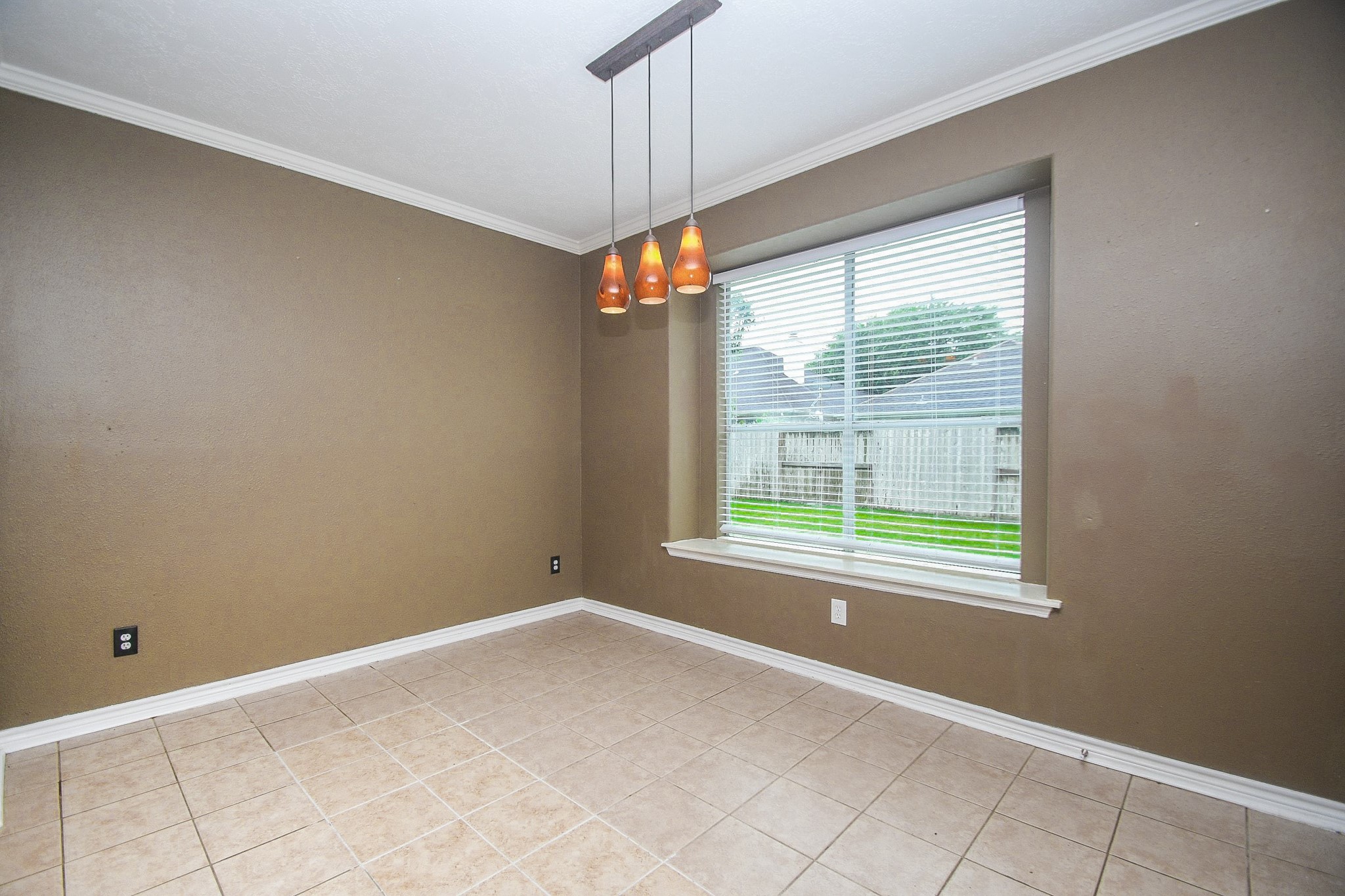 5602 Walkabout Way Katy, TX 77450 - Photo 11 of 33 a view of an empty room with a window