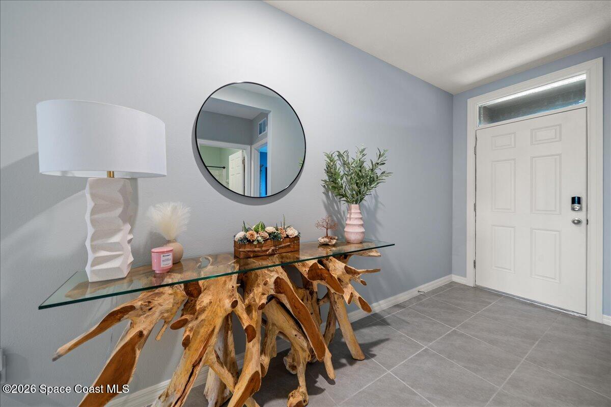 926 Trinity Street Rockledge, FL 32955 - Photo 3 of 56 08-Front Entry