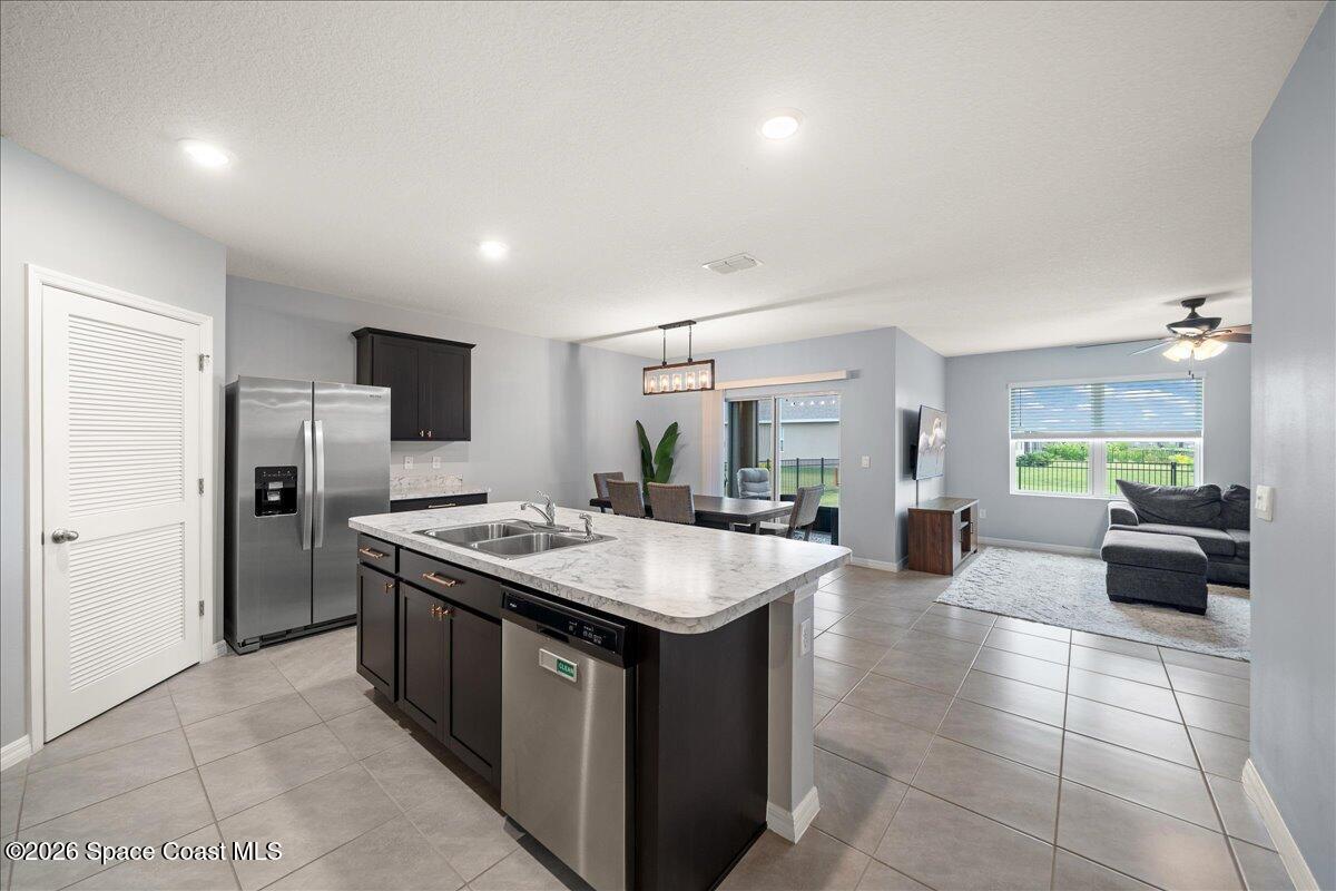 926 Trinity Street Rockledge, FL 32955 - Photo 8 of 56 09-Kitchen & Family Room