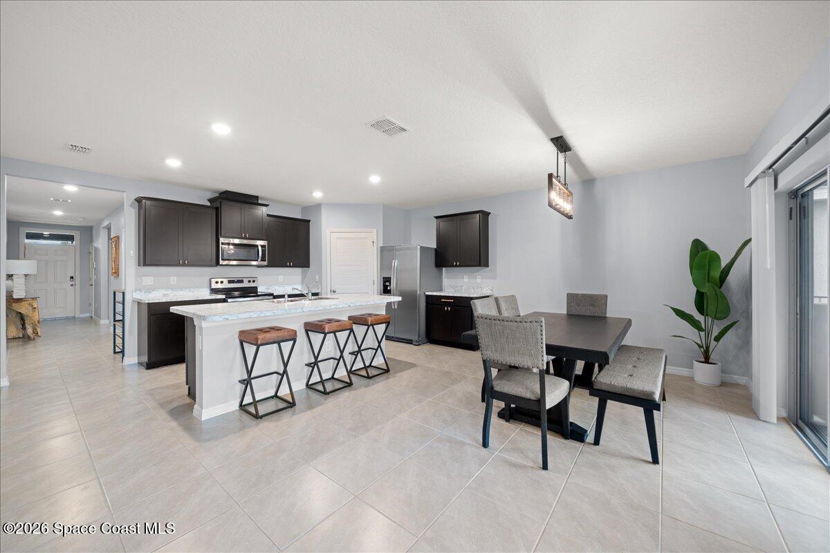 926 Trinity Street Rockledge, FL 32955 - Photo 9 of 56 10-Kitchen & Dining