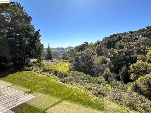 a view of swimming pool with a yard