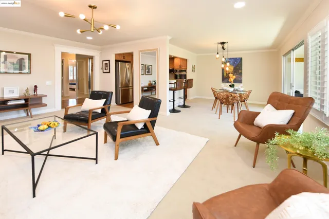 a living room with furniture and a table