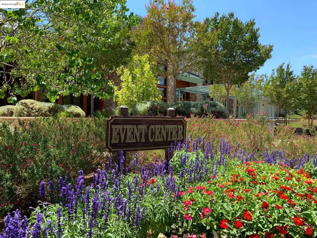 a view of a street with a building in the background
